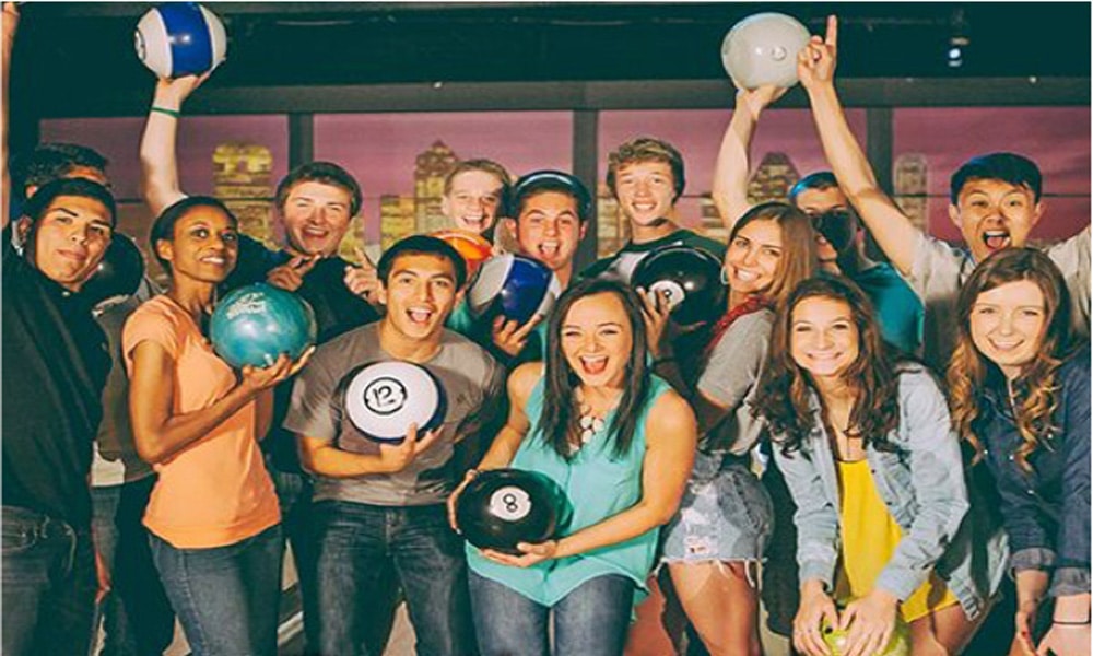 group of people bowling